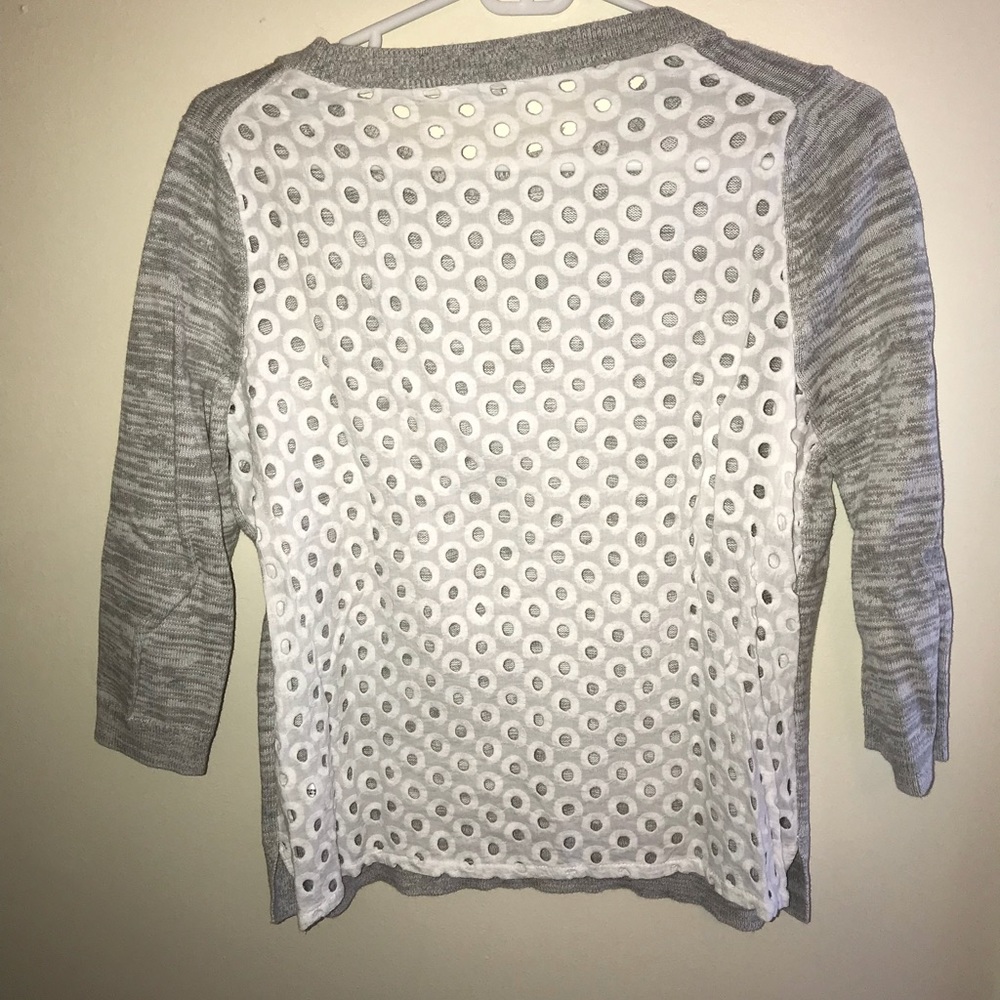 Gray sweater holey back
